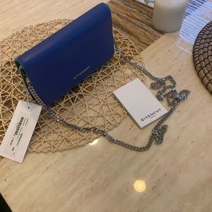 Givenchy cross bag.  tags attached, authentic.